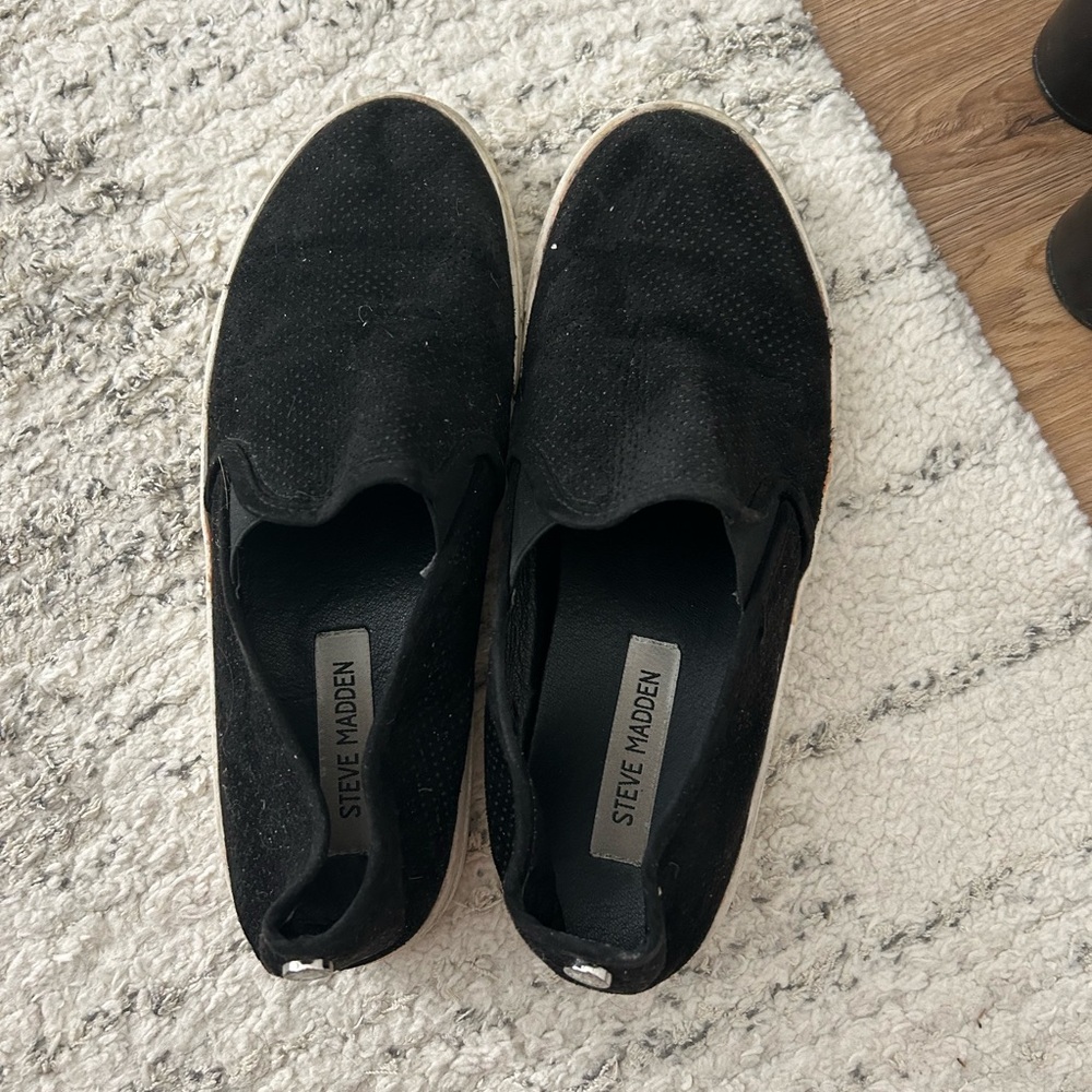 Black Steve Madden slip ons